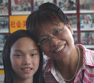 Headshot of  Our Daughter and the Orphanage Director.